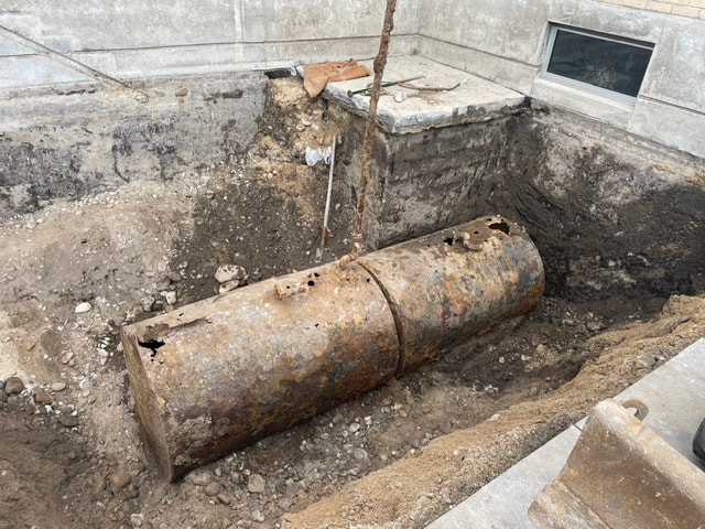 Exposed underground storage tank during a removal project
